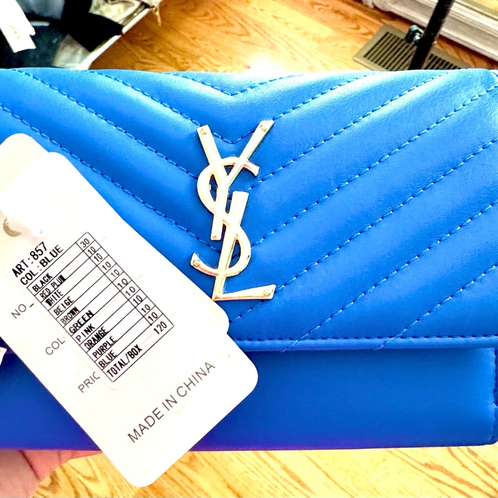 Vibrant Blue Leather Clutch with Gold Accents iconic monogram